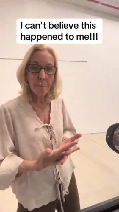 Karen blocks people from leaving parking garage, attempts to open their door while telling them to go back to where they’re from