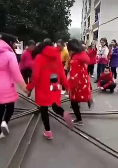 Children hopping through poles. Is it possible for this to be both r/sweatypalms and r/oddlysatisfying ? (via: artistworldly on IG)