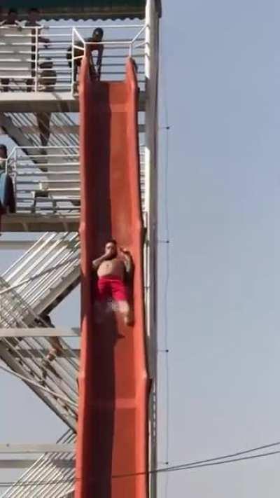 WCGW swimming in front of a waterslide