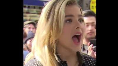 Chloe Grace Moretz opening wide