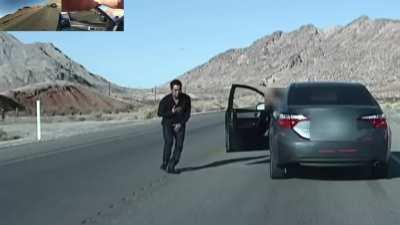 Man Points Finger Guns At American Cops, TWICE