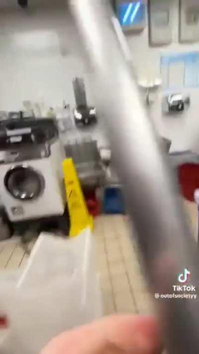 Guy shoves a broom in the deep fat fryer in McDonalds