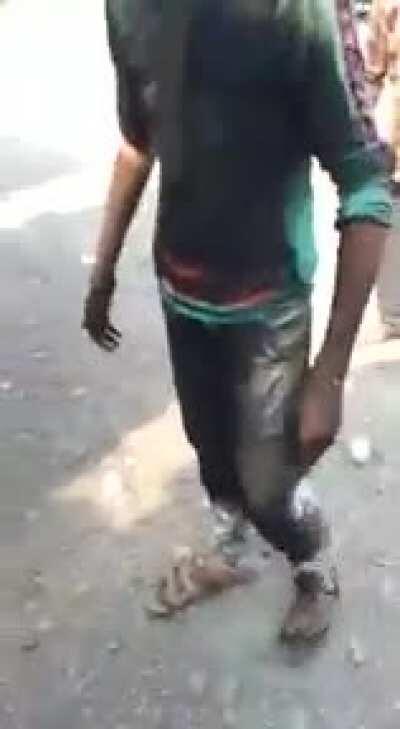 Guy blocks the exhaust pipe of a big truck