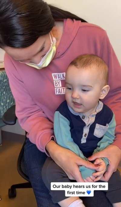 Kid hearing for the first time, instantly switching from crying to a real big grin