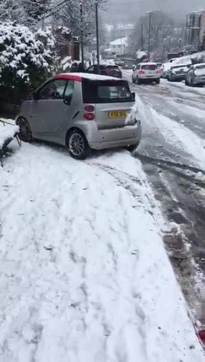 WGCW overtaking a car on a steep hill that's covered in snow?