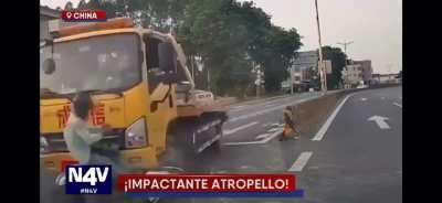 Motorcyclist attempts U Turn 