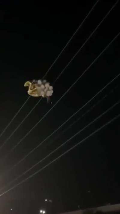 Girl Releases Graduation Balloons And Hit Power Lines Taking Out Power In Entire Neighborhood