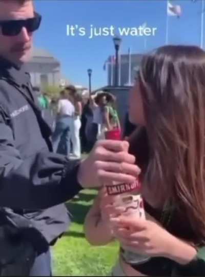 College girl gets busted with an open alcohol bottle.