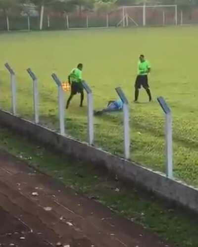 Linesman (assistant referee) knocked him out.