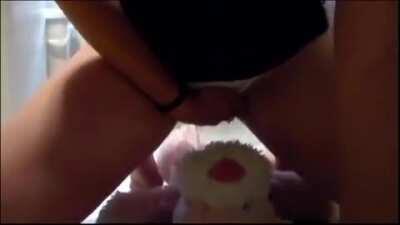 Wetting herself on teddy