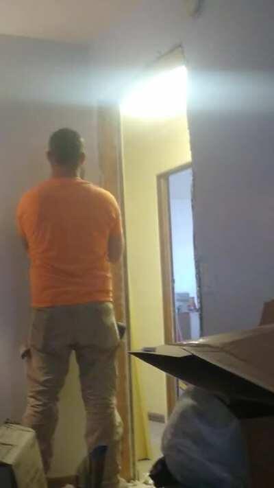 My gfs ex kicked in her door... And this is it getting fixed... He set of the fire alarm 3 times