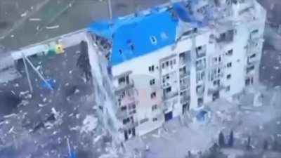 Russian soldiers demolished the five-storey building in which Ukrainian Armed Forces had settled in, throwing several charges (TM-62) in it. Unknown location. Around 19 December, 2024.
