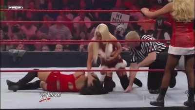 Jillian Hall wrestling with other divas