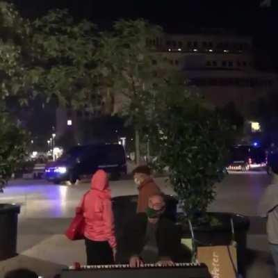 Piano player calmly keeps on playing during a heated protest in Barcelona
