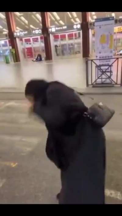 A woman in Italy freaks out in response to seeing a Man and Woman Kissing 