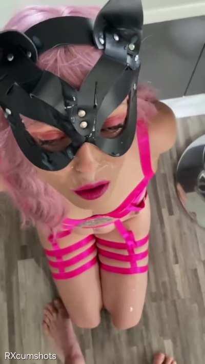 Masked girl gets a facial drenching...