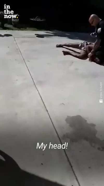 Another cop kneeling on a man’s head