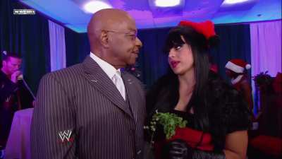 Aksana meeting Teddy Long at the Christmas Party