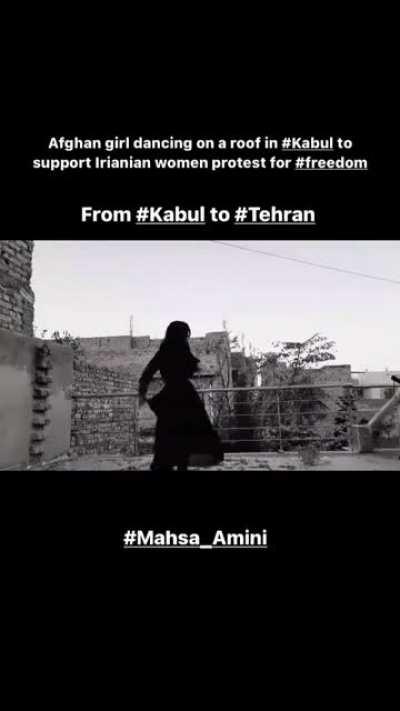 Afghan girl dancing on a roof in #Kabul to support Irianian women protest for #freedom From #Kabul to #Tehran