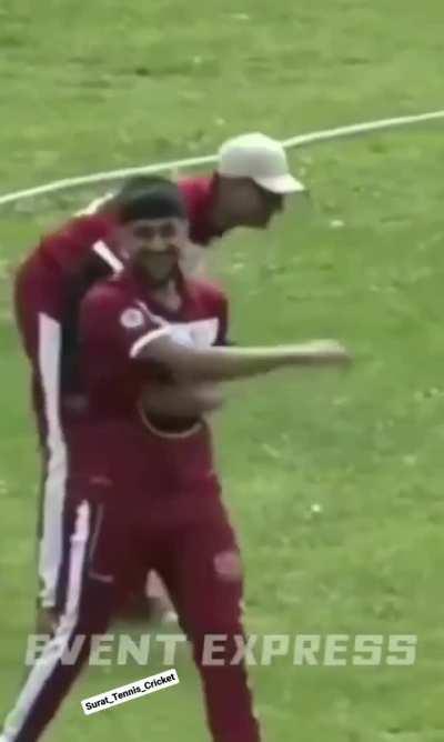 Batsmen hits the ball but fielder scores a boundary.