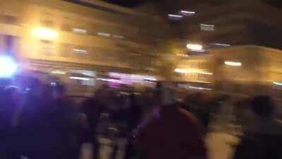 NSFW: Man gets backed into wall by Proud Boy crowd before pulling a knife and stabbing two. He is then beaten unconscious by the crowd.