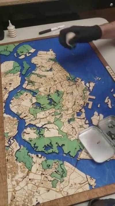 Quit my dead end job in digital mapmaking a few years ago to make them on wood instead.