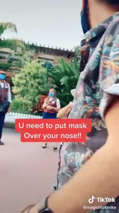 Self proclaimed rebel thinks he's a bad ass for not wearing a mask properly at Disney.