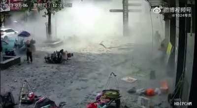 Just some small tiles falling off the building facade