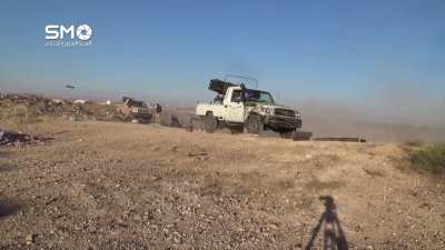 Southern Front fighters using modified MLRS Toyotas to target Syrian Army positions - Daraa - 2015