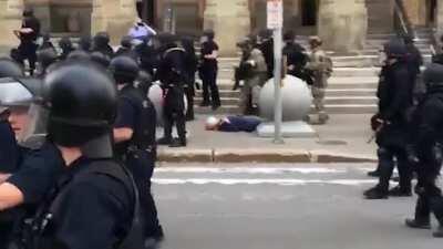 Both angles of the Buffalo police pushing a 75-year-old man to the ground.