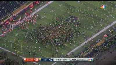 In the midst of the COVID-19 pandemic, Notre Dame fans rush the field after beating #1 Clemson 47-40