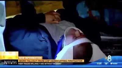 Cop arrests fire fighter in the middle of tending to a wounded civilian because fire truck was 1 mm over the line.