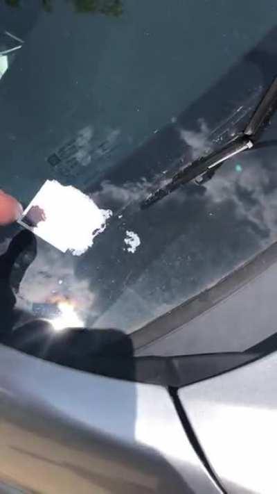 Came back from a trip and found this Jesus card fused to my windshield.