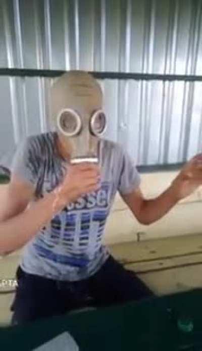 WCGW drinking with a mask on