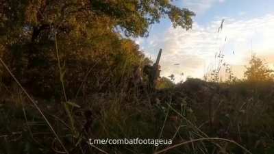 A group of Ukrainian soldiers fires at Russian positions with AGS-17, a 60mm mortar and an RPG-7. Bakhmut direction.