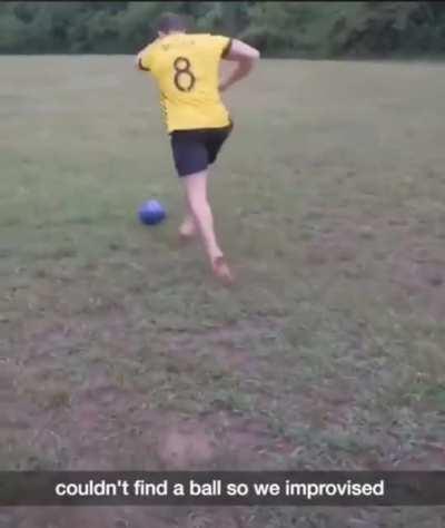 Playing soccer with a bowling ball