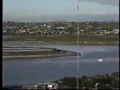 The way the camera man zooms, pans, zooms then keeps the diver in sight the entire time. PTCM