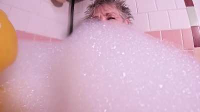 Enjoying a bubble bath -- I just wish the bubbles were larger