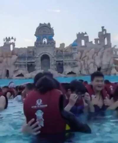 Dude on the inflatable whale dominates life.