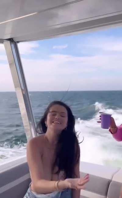 Selena singing on a boat | IG July 2023