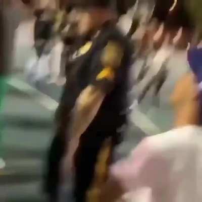 Police officer engages in a dance-off