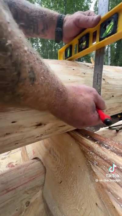 Adding one log to a log cabin