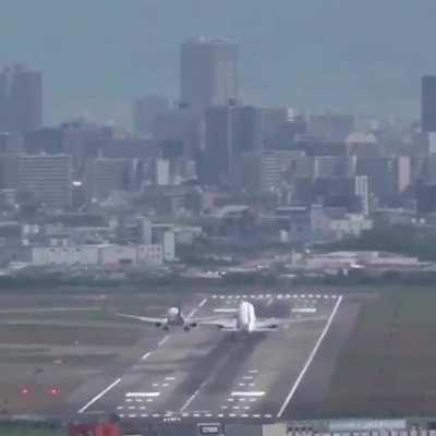 A takeoff, an attempted landing, same runway, at same time