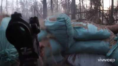 UA POV Kreminna. 1st person POV from a Ukrainian soldier. Firing rounds and seeing explosives go off.