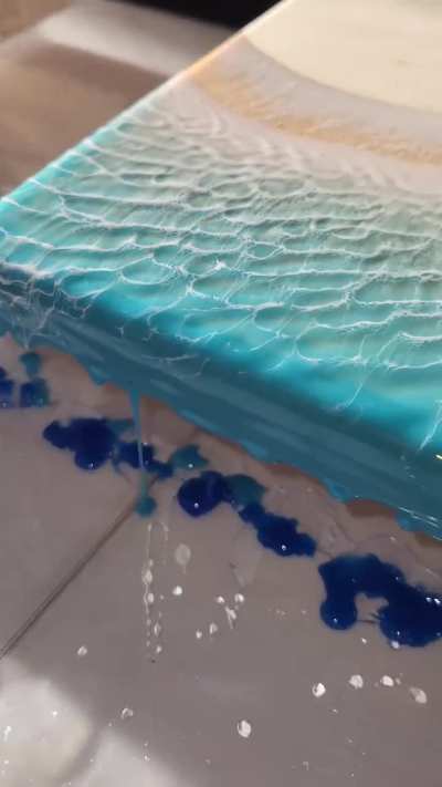 Using a blower to design waves on a resin serving board