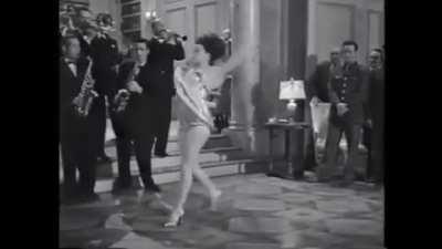 Miriam LaVelle flipping in heels, 1944