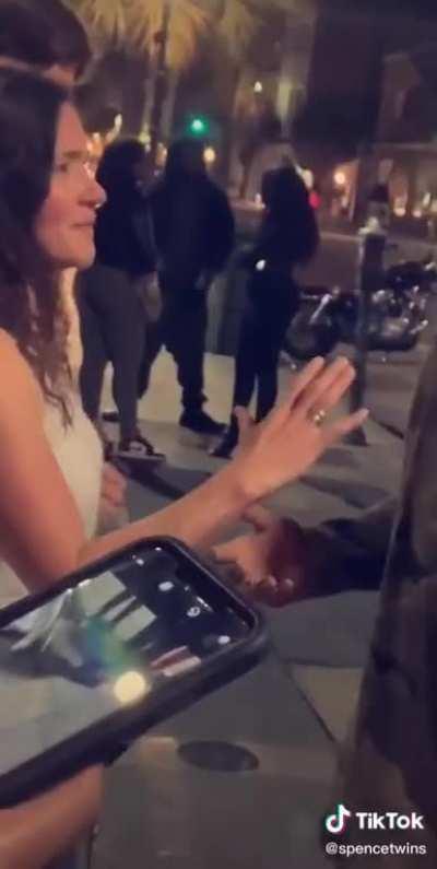 All in front of her husband...