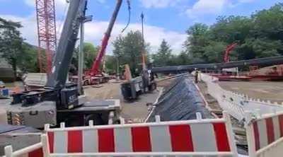 ... standing under a lifted object