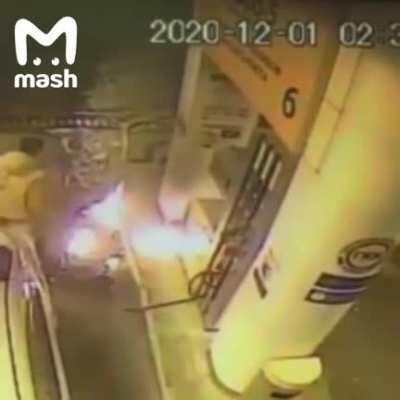 Driver decides to look a little closer in the gas tank, helping himself with a lighter