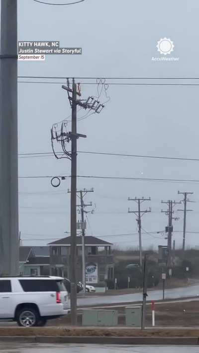 Power pole catches fire and then goes bzzzzzzt.